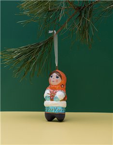 Ялинкова іграшка " Дівчинка в помаранчевій хустині  " (скульптура)