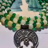 Lunula Pendant with Onyx and Green Crystal