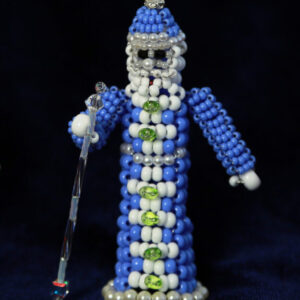 Santa in Blue Coat Figurine