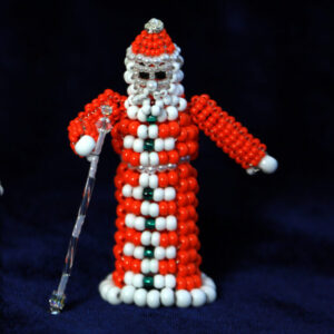 Santa in Red Coat Figurine